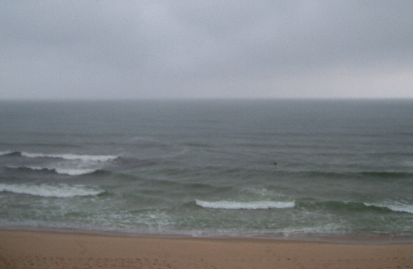 [Stormy+Atlantic+with+Surfer.jpg]