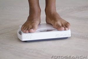 [person-standing-on-a-weighing-scale-~-fr07027.jpg]