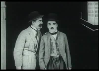 [mid-Charlie_Chaplin%2C_bond_of_friendship%2C_1918_ogg.jpg]