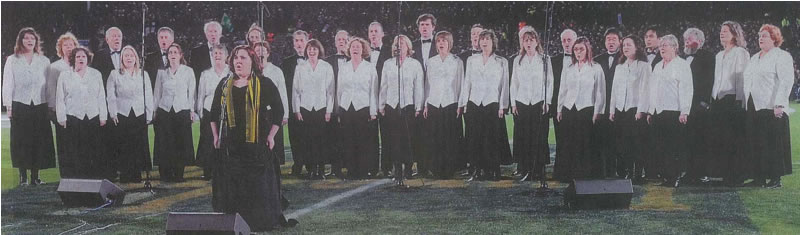 Claire Barton and the City of Dunedin Choir singing the South African national anthem. Photo: Craig Baxter.