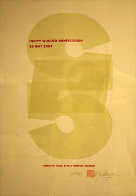 Large 5s overlapping, and smaller type that reads Happy Wooden Anniversary, 2004, Hamilton Wood Type Museum
