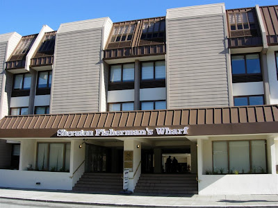 a building with a brown awning