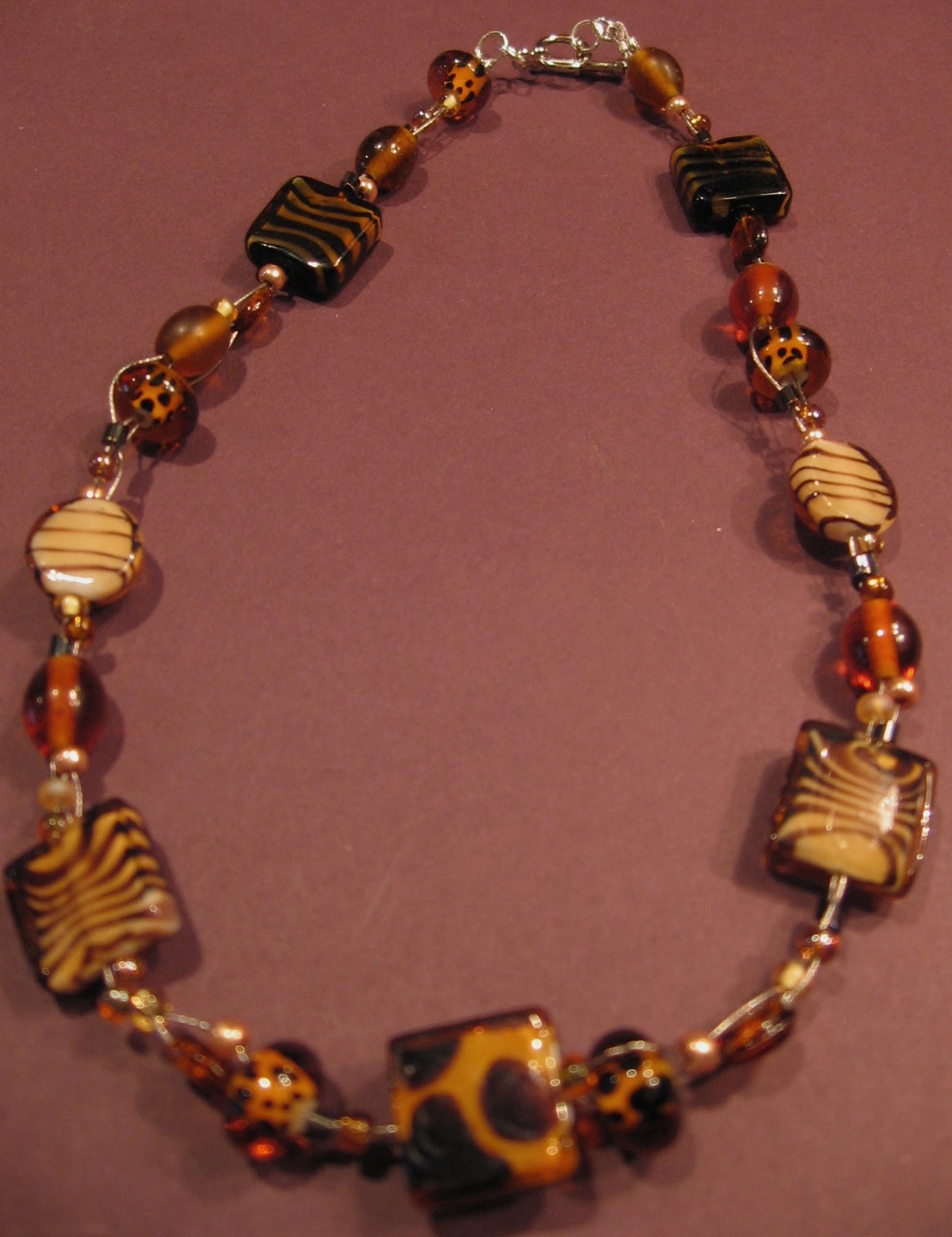 [#097+The+Tigress+3+strand+necklace.jpg]