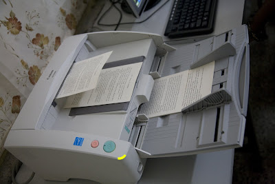 Scanner scanning a book