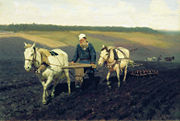 [180px-Tolstoy_ploughing.jpg]