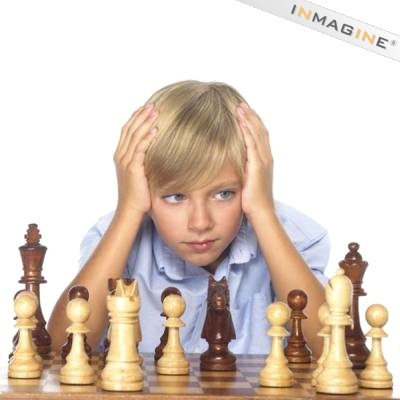 [Boy+pondering+chess+move.jpg]