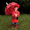 [child+with+umbrella.jpg]