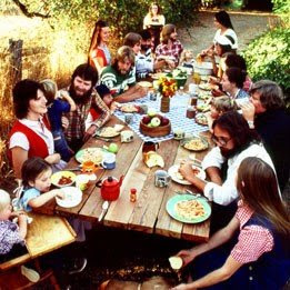 From the Rockin' Revival album back-cover.  A young Autumn in black hair reaching for some food, in the lower left.