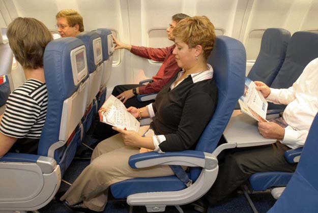 [airline+seat+with+people.jpg]