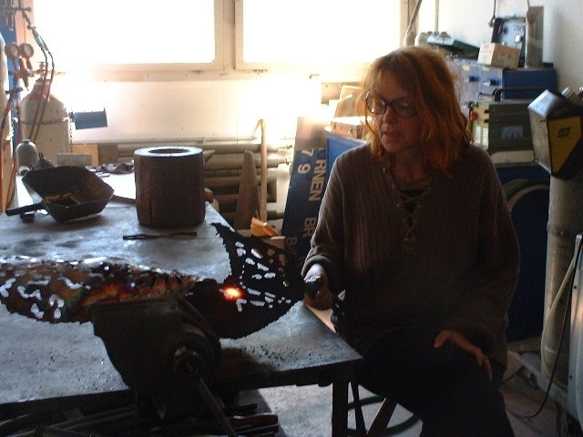 THE ARTIST BARBARA STREIFF BY BURNING FIRST SYMBOLS ON COPPER