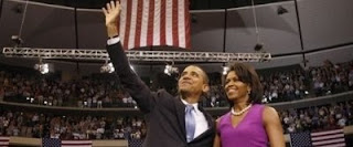 Barack and Michelle Obama during victory speeach