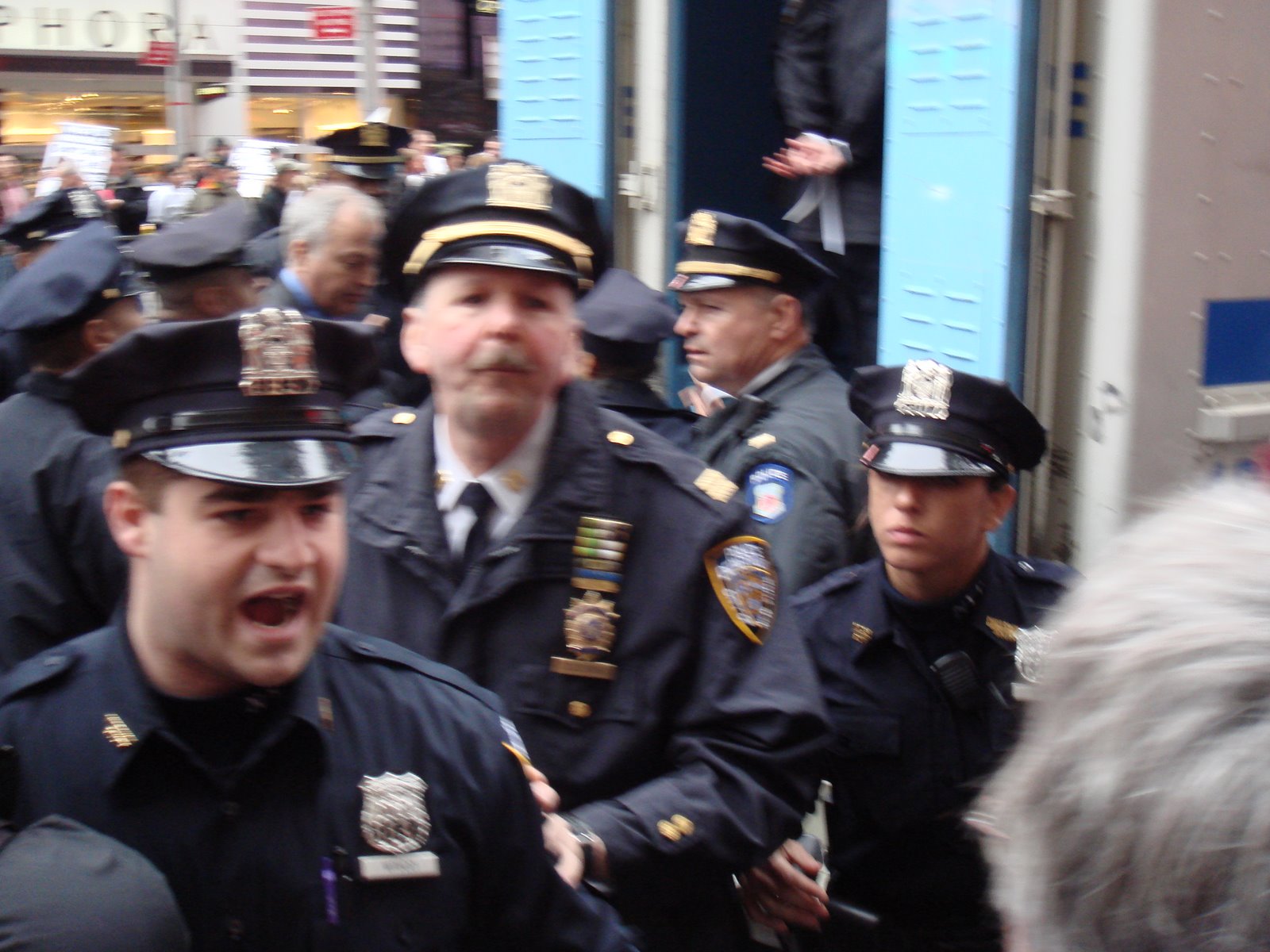 [NYPD+Loading+Sharon+Kleinbaum+and+Matt+Foreman+into+Van.JPG]