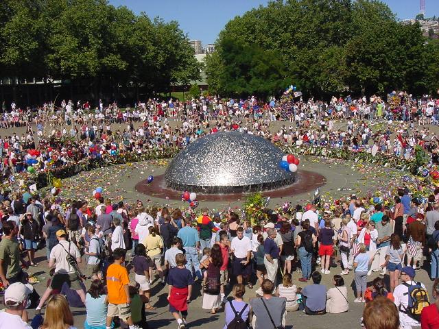 [fountain_filled_with_flowers_and_people.jpg]