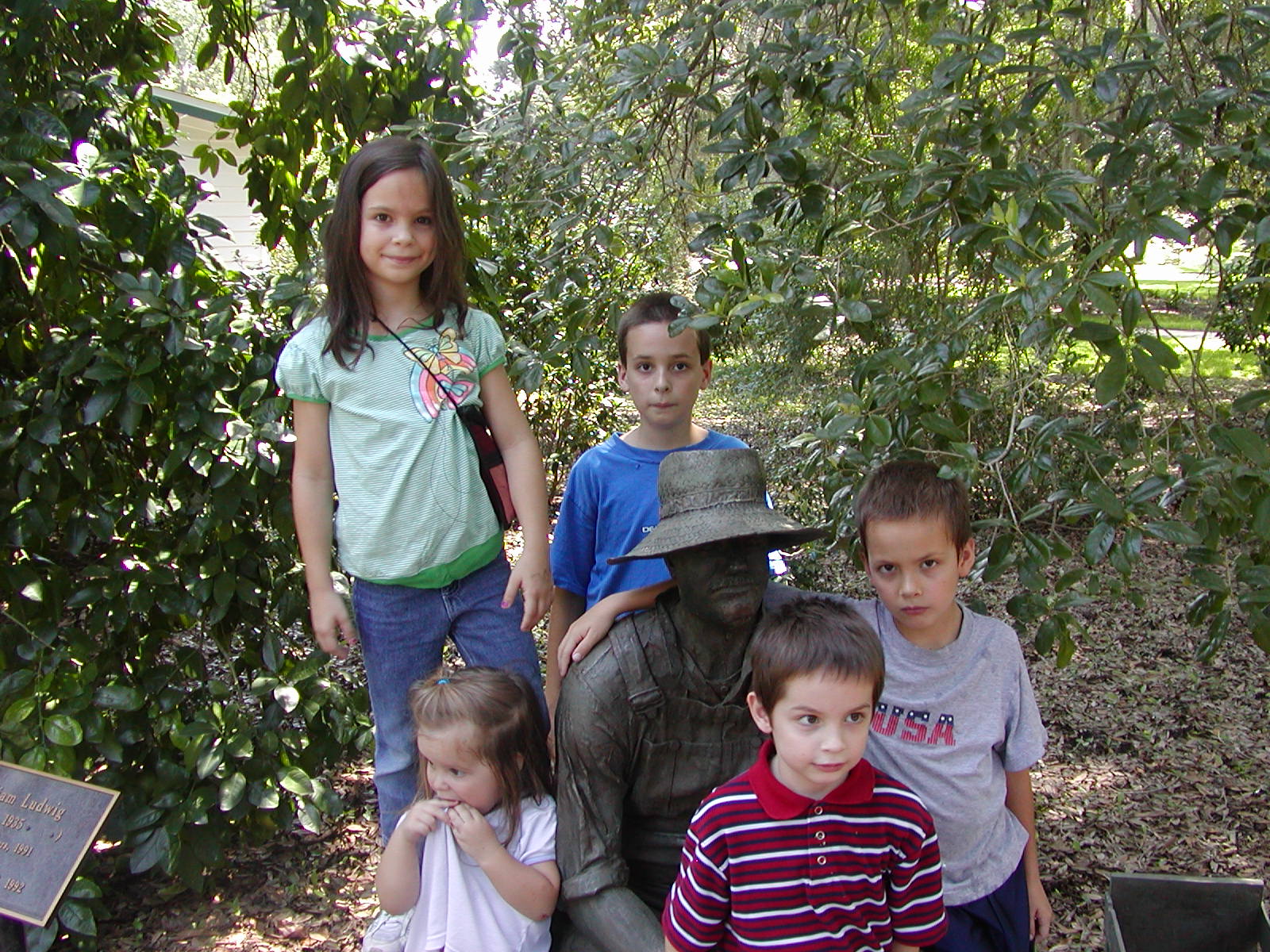 [Five+kids+with+orange+picker+statue.JPG]