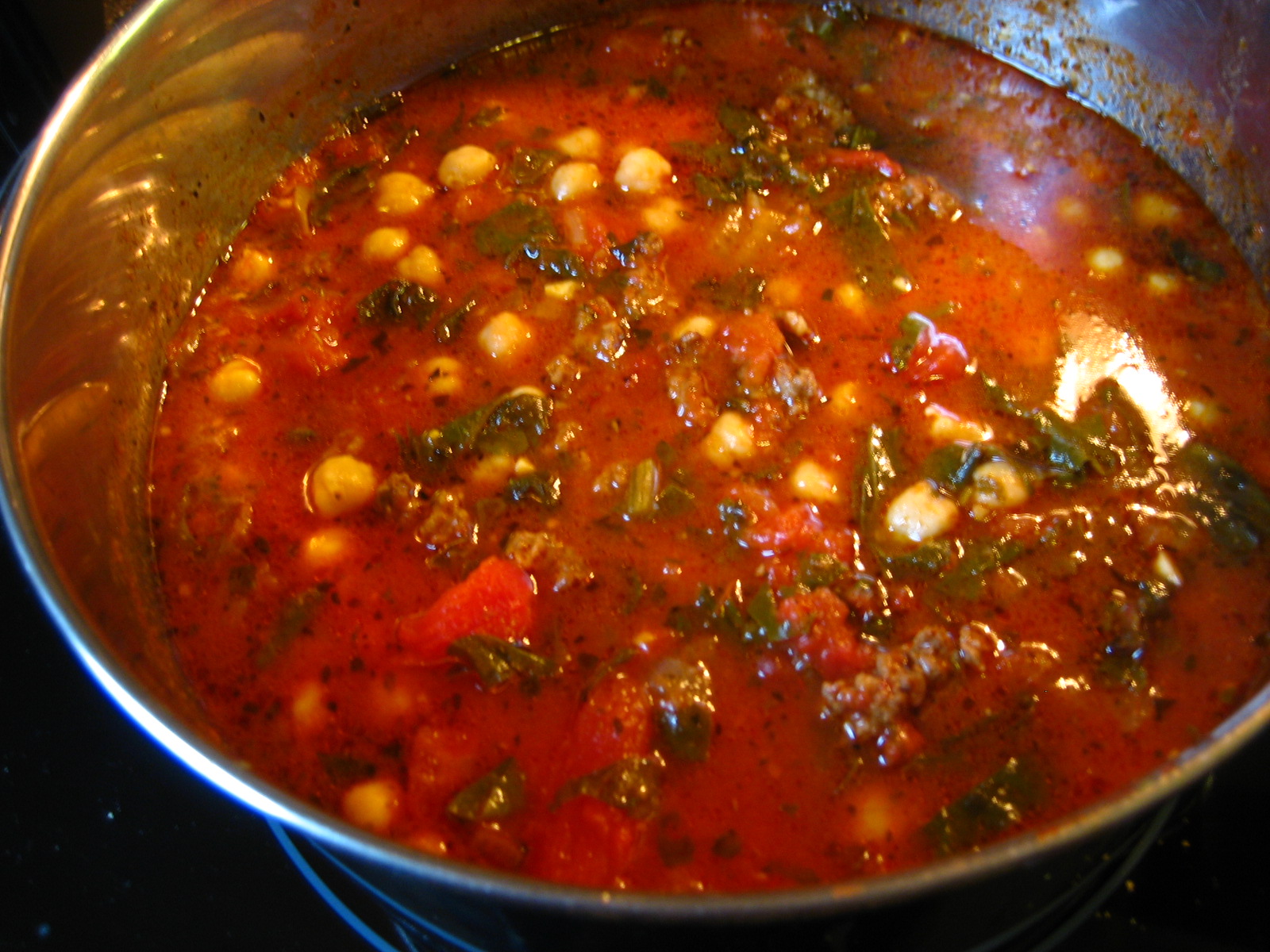 [chorizo,+tomato+&+beet+green+soup.JPG]