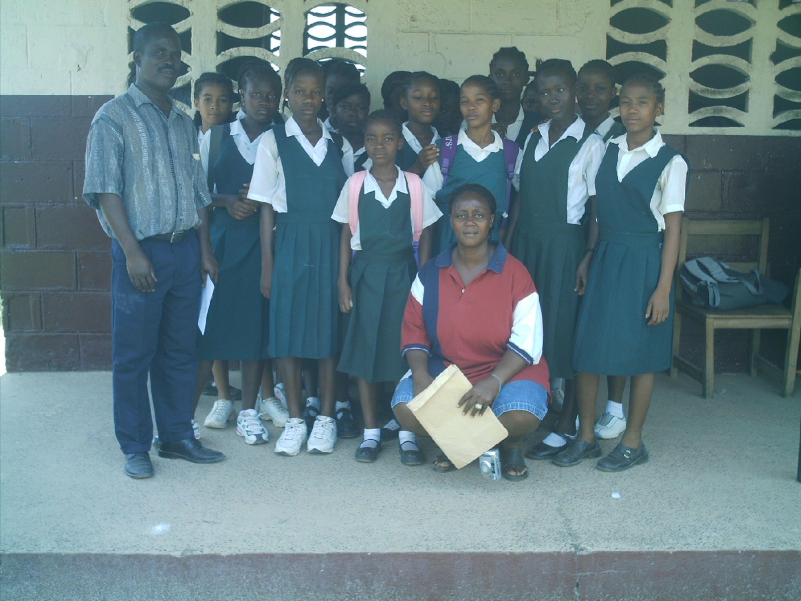 [Emily+with+principal+and+members+of+the+sixth+grade+class+of+St.+Martin.JPG]
