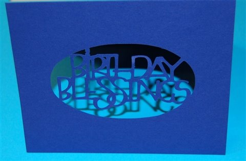 [Birthday+blessings+oval+aperture+card+on+blue.jpg]