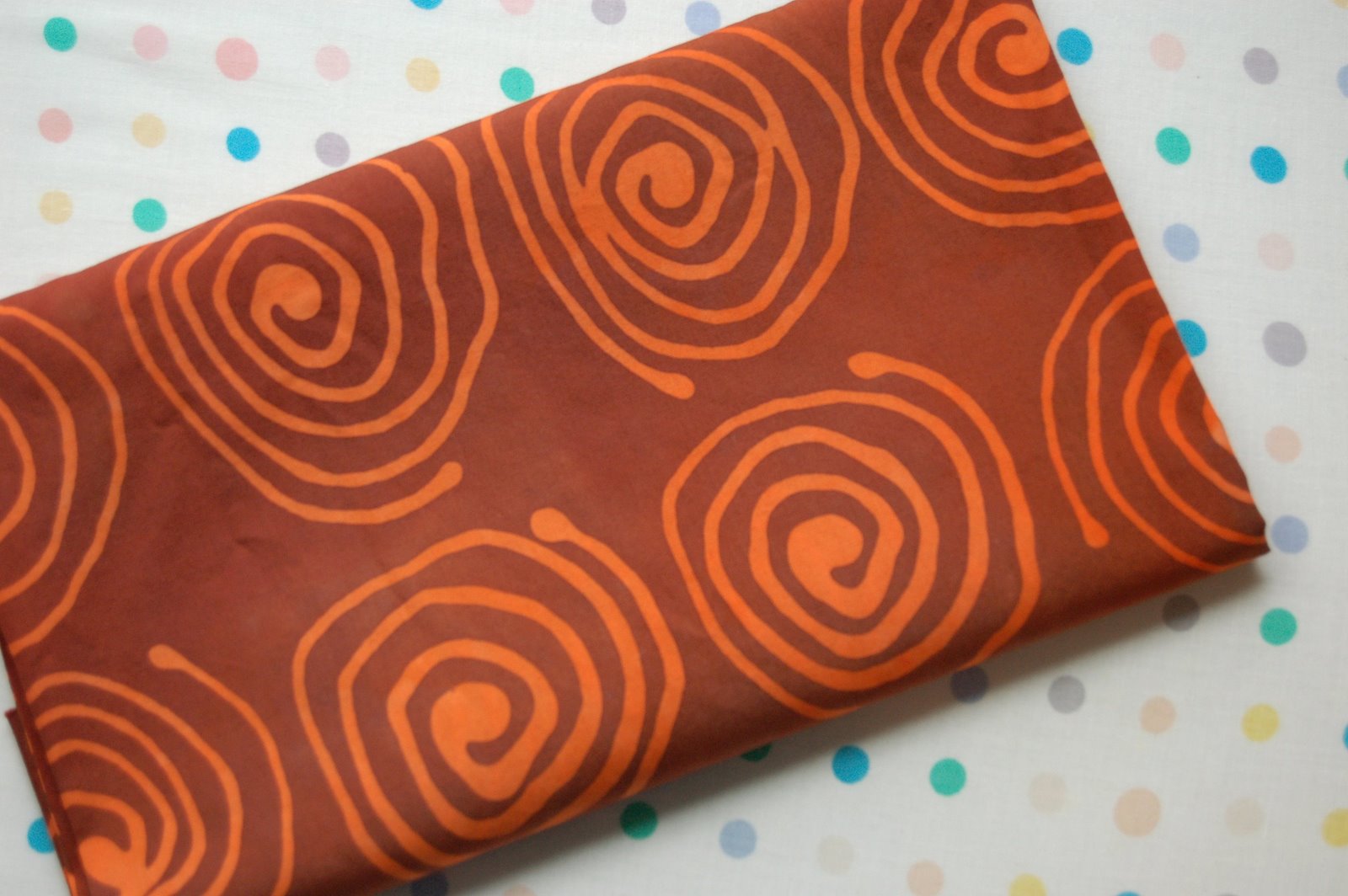 [swirl+fabric+folded+2.jpg]