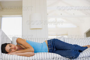 [woman-sleeping-couch_~px258001.jpg]