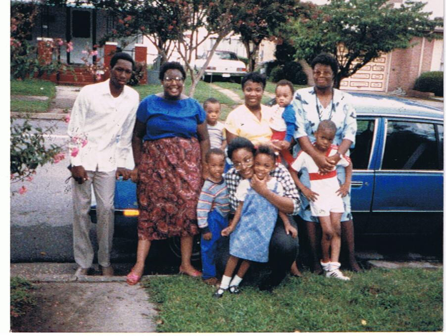[family+in+front+of+first+car.JPG]