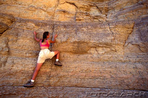 [woman-rock-climbing-~-u17431616.jpg]