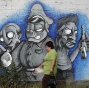 [graffiti-protesta-mural-mexicano--180x160.jpg]