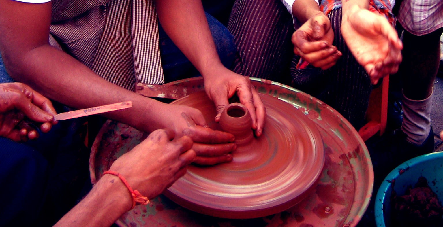 [hands+at+pottery.jpg]