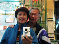 John and I, fooling around in front of a mirror at Genting Hotel