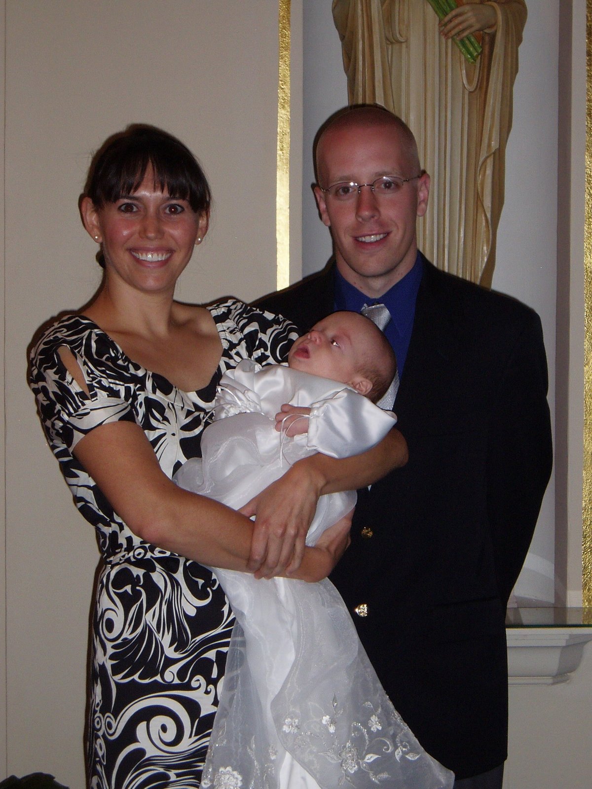 [070608+Michael+with+His+Godparents.JPG]
