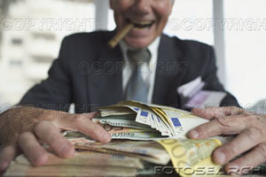 [man-with-cigar-and-stack-of-euros-~-bxp211820.jpg]