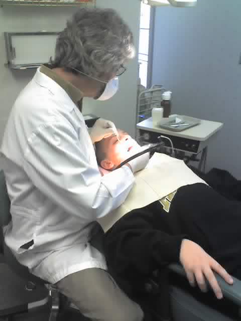 Richard getting a cleaning by Dr.Webber today.  He didn't have any cavities and is still waiting for two mollers to come in.