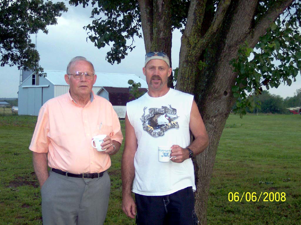 [Dad+and+Greg+standing+in+what+was+once+our+kitchen_clar.jpg]