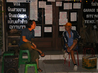 sitting and chatting with a Thai man