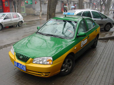 Beijing Taxi in a hutong