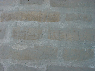 Allied soldiers' graffiti on the stone walls