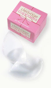 picture of a pink box of Cupcake Cleavage, with a picture of two silcone faux breast sitting next to the box