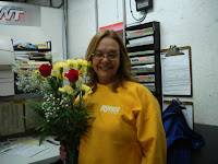 Lori holding her bouquet of flowers